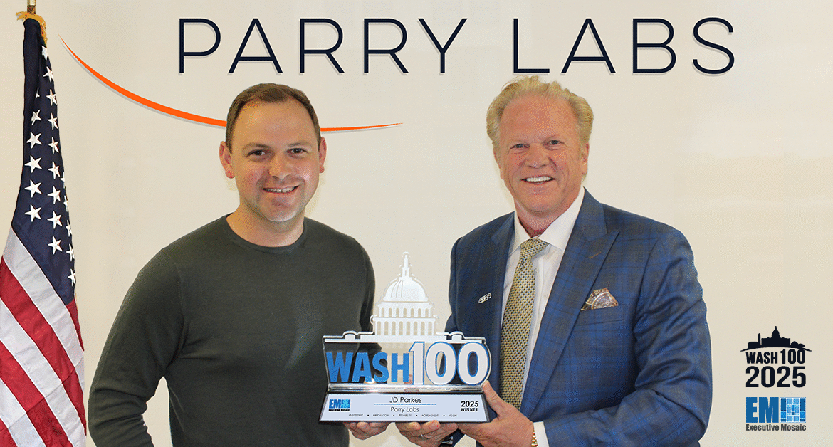 Parry Labs CEO JD Parkes posing with Jim Garrettson and 2025 Wash100 Award