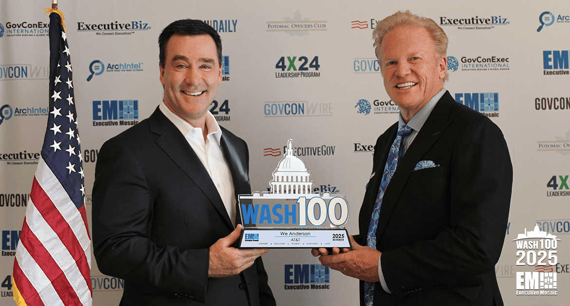 Executive Mosaic CEO Jim Garrettson presenting the 2025 Wash100 Award to Wes Anderson, president of public sector at AT&T