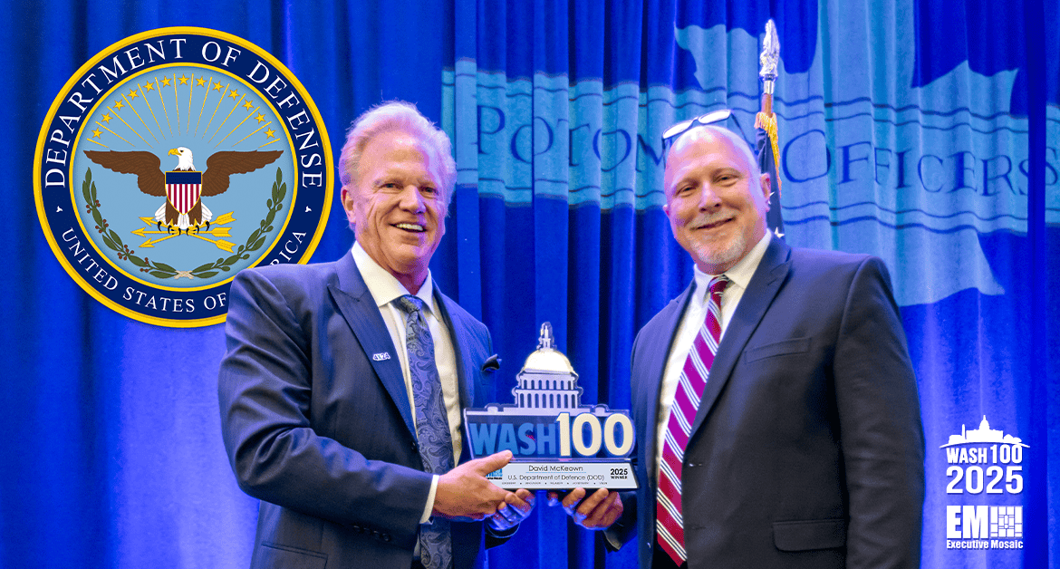 David McKeown, DOD CIO special assistant for cybersecurity innovation, posing with Jim Garrettson and the 2025 Wash100 Award