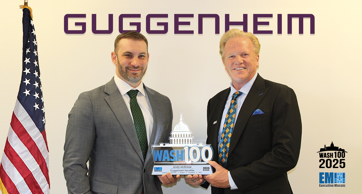 Andy McEnroe of Guggenheim Securities posing with Jim Garrettson and the 2025 Wash100 Award