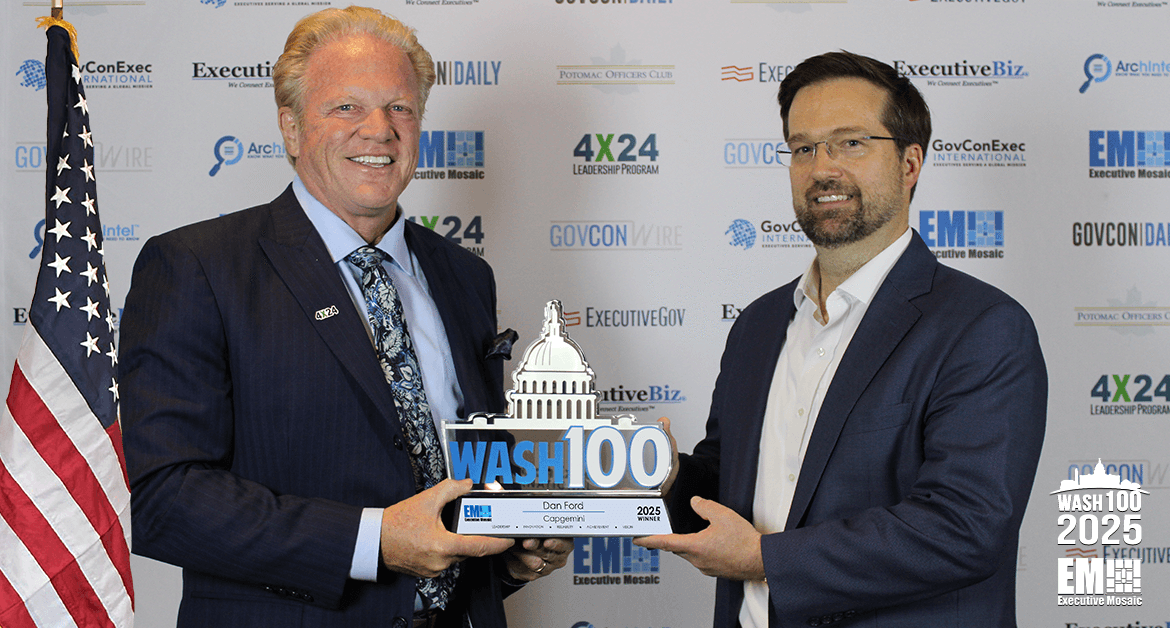 Dan Ford, chair and CEO of Capgemini Government Solutions, accepts first Wash100 trophy